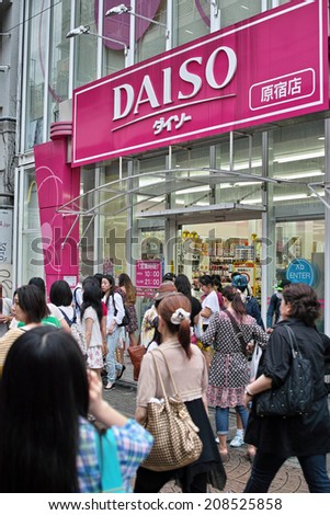 HARAJUKU, TOKYO - JUNE 29, 2014: DAISO 100 YEN Shop in Takeshita Street which is a pedestrian street with many fashion boutiques and groceries. 100 YEN shop offers all goods with 100 Japanese Yen.