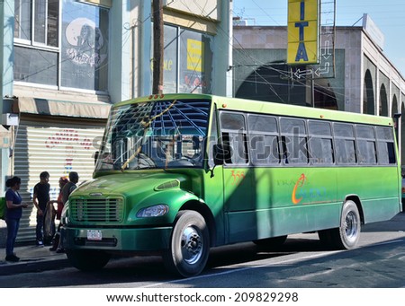 AGUASCALIENTES, MEXICO - NOVEMBER 10, 2013: Transit bus in downtown Aguascalientes city, Aguascalientes State, North central Mexico.