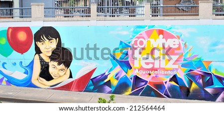 AGUASCALIENTES, MEXICO - OCTOBER 19, 2013:  Graffiti of children by anonymous artist in downtown Aguascalientes, Mexico.