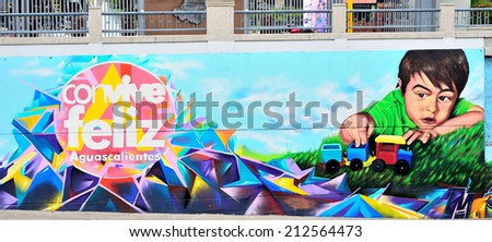 AGUASCALIENTES, MEXICO - OCTOBER 19, 2013:  Graffiti of children by anonymous artist in downtown Aguascalientes, Mexico.