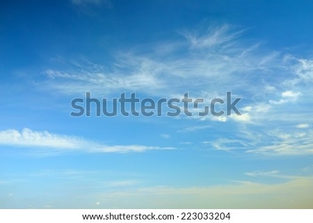 Flow of white clouds on blue sky background