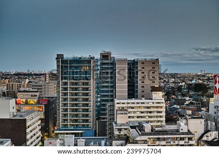 CHOFU, TOKYO - DECEMBER 7, 2014: Buildings of the commercial district of Chofu City, western part of Tokyo. About 20 km from the center of Tokyo and the population is approx. 230,000.