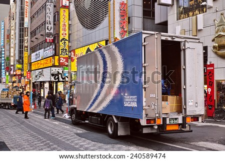 SHINJUKU, TOKYO - DECEMBER 27, 2014: Delivery truck of Sagawa Express, one of the biggest parcel delivery companies in Japan.