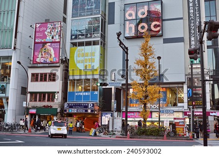 SHINJUKU, TOKYO - DECEMBER 27, 2014: Commercial district of Shinjuku, the biggest night life town in Japan. It is called as unsleeping city. Many restaurants and bars are open till dawn.
