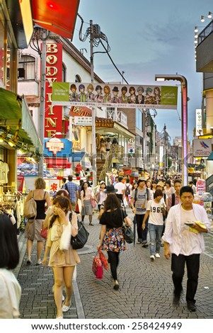HARAJUKU, TOKYO - JULY 26, 2014: Takeshita Street, pedestrian street with a lot of shops, densely standing side by side. Main target customers are early teenagers.
