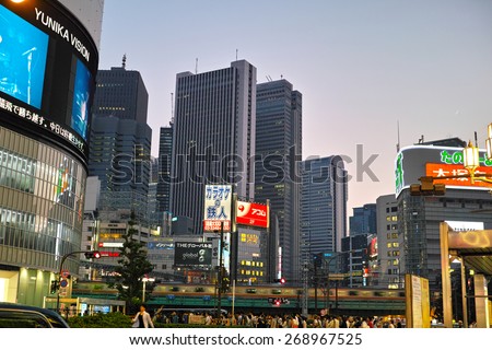 SHINJUKU, TOKYO - MAY 31, 2014: Shinjuku commercial district illuminated at night. Shinjuku is one of the biggest & busiest night life area in Japan.