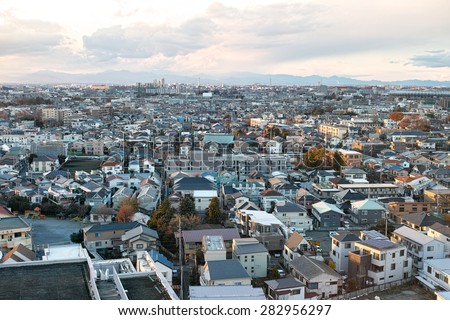 CHOFU, TOKYO - DECEMBER 14, 2014: Buildings of the commercial district of Chofu City, western part of Tokyo. About 20 km from the center of Tokyo and the population is approx. 230,000.