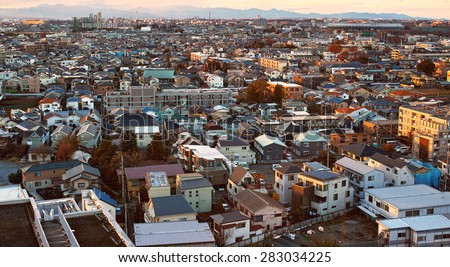 CHOFU, TOKYO - DECEMBER 14, 2014: Buildings of the commercial district of Chofu City, western part of Tokyo. About 20 km from the center of Tokyo and the population is approx. 230,000.