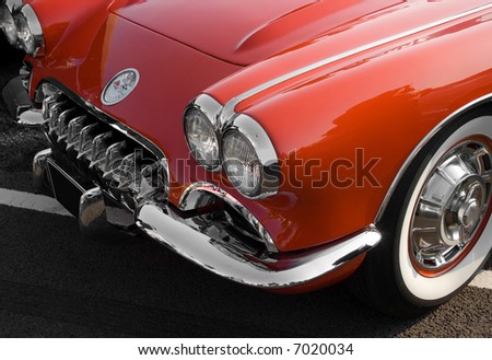 Vintage red Chevrolet Corvette sports car with chrome trim