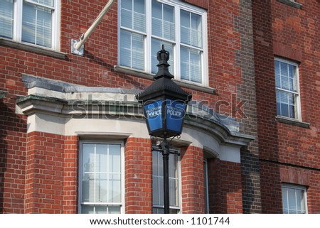 English Police Station with traditional sign
