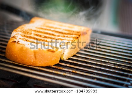 Slice of bread toasted with smoking