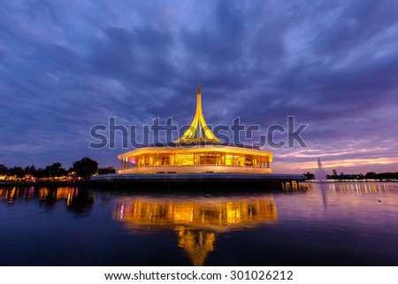 Monument at public park against water with night light Suan Luang Rama 9, Thailand