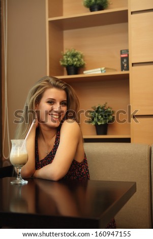 Beautiful business woman in restaurant