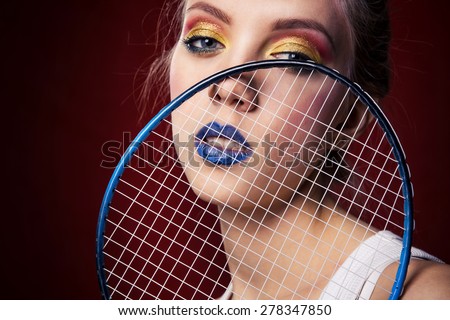 Girl with a tennis racket marked-up