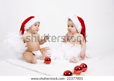 children disguised of Papa Noel