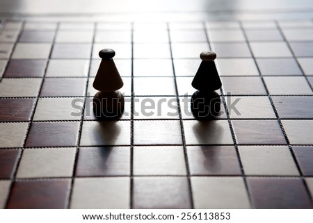 Chess board with chess bishop on light color background