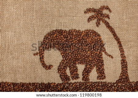 Elephant under palm made from coffee beans. On burlap pattern