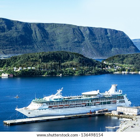 Norway cruise - passenger ship in Alesund, Norwegian fjords.