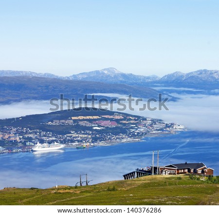 Norway cruise: panorama of Norwegian city Tromso from mountain in Norwegian fjords.
