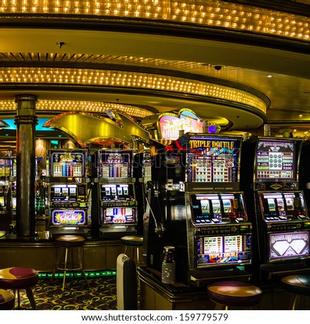 Gaming slot machines in American gambling casino in the cruise liner of Royal Caribbean International, USA