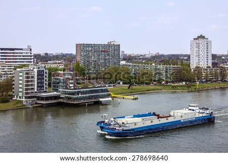 Rotterdam, Netherlands, seafront port buildings and cargo ship