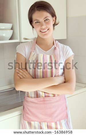 beautiful smiling girl in the kitchen