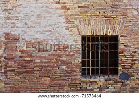 Old Ruined Brick Wall With Square Window