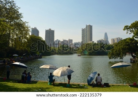 GUANGZHOU, CHINA, OCTOBER 2, 2013: People are enjoying sunny afternoon in park in guangzhou.