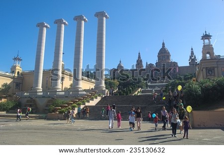BARCELONA, SPAIN, OCTOBER 23, 2014: Plaza espana in barcelona is a famous place for its magic fountain show, artificial waterfall, national museum and dozens of tourist admiring all of them.