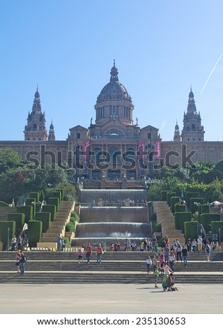 BARCELONA, SPAIN, OCTOBER 23, 2014: Plaza espana in barcelona is a famous place for its magic fountain show, artificial waterfall, national museum and dozens of tourist admiring all of them.