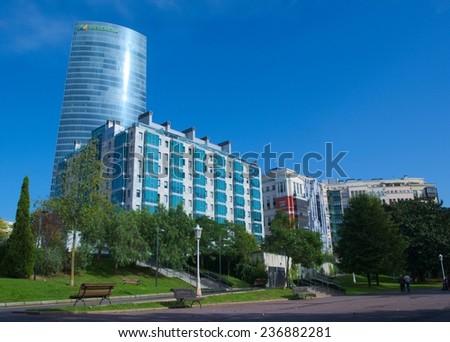 BILBAO, SPAIN, OCTOBER 27, 2014: View of the central park in spanish building with iberdrola skyscraper behind it.