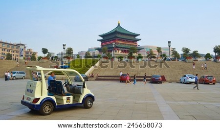 XIAN, CHINA, AUGUST 24, 2013: People are gathering ont he square in front of the bell tower in chinese city xian.
