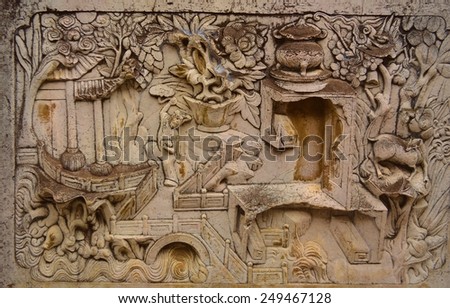JIANSHUI, CHINA, NOVEMBER 15, 2013: detail of carved artwork inside zhu family garden complex in chinese city jianshui.