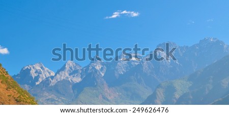 QIAOTOU, CHINA, NOVEMBER 20, 2013: view of the jade dragon snow mountain taking from the upper path of tiger leaping gorge track in china.