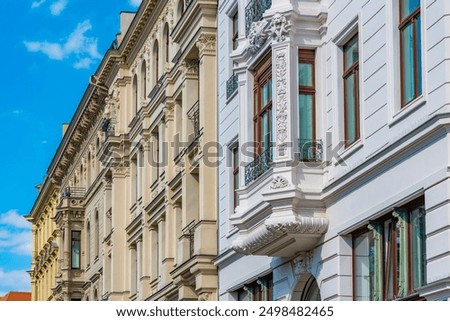 Similar – Image, Stock Photo elegant old building balcony with two box trees