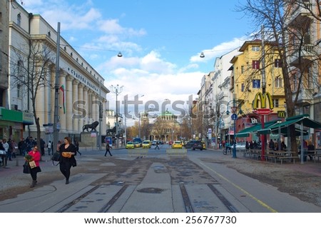 SOFIA, BULGARIA, NOVEMBER 16, 2014: people are walking on the Vitosha boulevard scene of downtown city of Sofia.