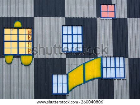 WIEN, AUSTRIA, JANUARY 4, 2015: detail of windows and colorful facade of the famous waste incinerator designed by friedensreich hundertwasser in spittelau, wien.