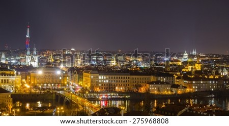 night view of prague including charles bridge, national theatre and old town square town hall taken from the prague castle.