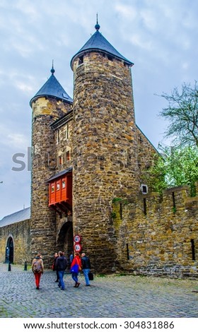 MAASTRICHT, NETHERLANDS, APRIL 12, 2014: Helpoort is one of the few functioning mediaval gates to maastricht city in the netherlands and it is also part of fortification.