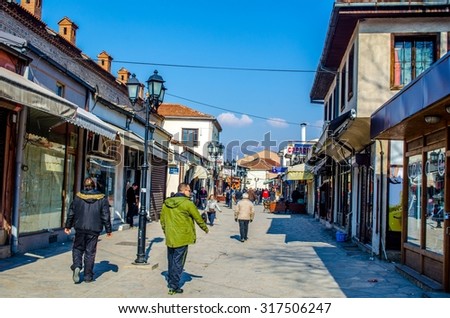 SKOPJE, MACEDONIA, FEBRUARY 16, 2015: People are Walking through the old town of skopje which consist of many narrow streets full of shops, restaurants and even marketplaces.