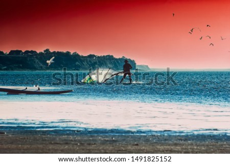 Similar – Foto Bild Surfbrett und rotes Klapprad am Strand