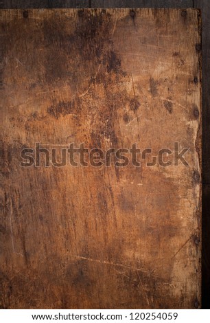 Wooden Panel with the Hammered Nails on the Edge