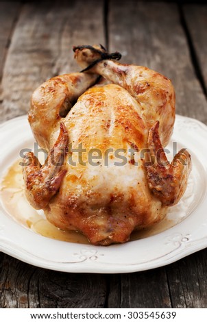 Chicken Grill on Vintage Plate on the Wooden Table, vertical image