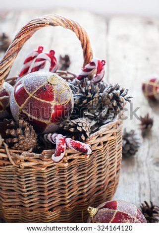 Christmas Vintage Gifts in Basket, Red Gold balls, Pine cones, Sweet Candy toys