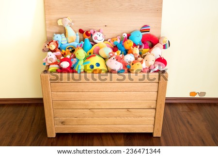 Toy Box full of soft toys in a child\'s bedroom