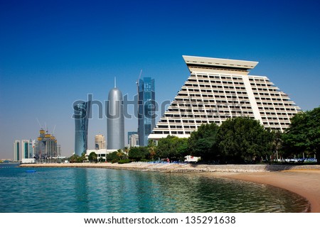 DOHA, QATAR - MAY 19: Iconic new towers grace the skyline of the West Bay area of Doha, Qatar on May 19, 2010 in Doha, Qatar. The West Bay is considered as one of the most prominent districts of Doha