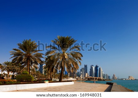 DOHA, QATAR - NOV 15: Iconic new towers grace the skyline of the West Bay area of Doha on Nov 15, 2013 in Doha, Qatar. The West Bay is considered as one of the most prominent districts of Doha