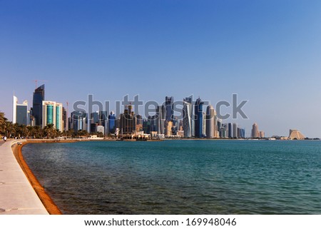 DOHA, QATAR - NOV 15: Iconic new towers grace the skyline of the West Bay area of Doha on Nov 15, 2013 in Doha, Qatar. The West Bay is considered as one of the most prominent districts of Doha