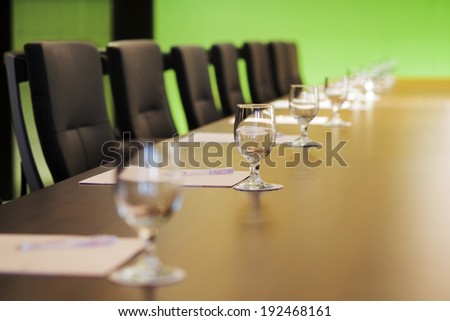 The boardroom table is set for the Annual General Meeting