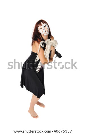 a redhead in a strange mask playing with a doll set on a white background